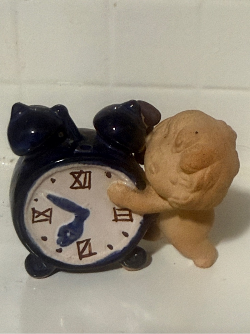 Japanese Ceramic Cherub Holding Alarm Clock Figurine
